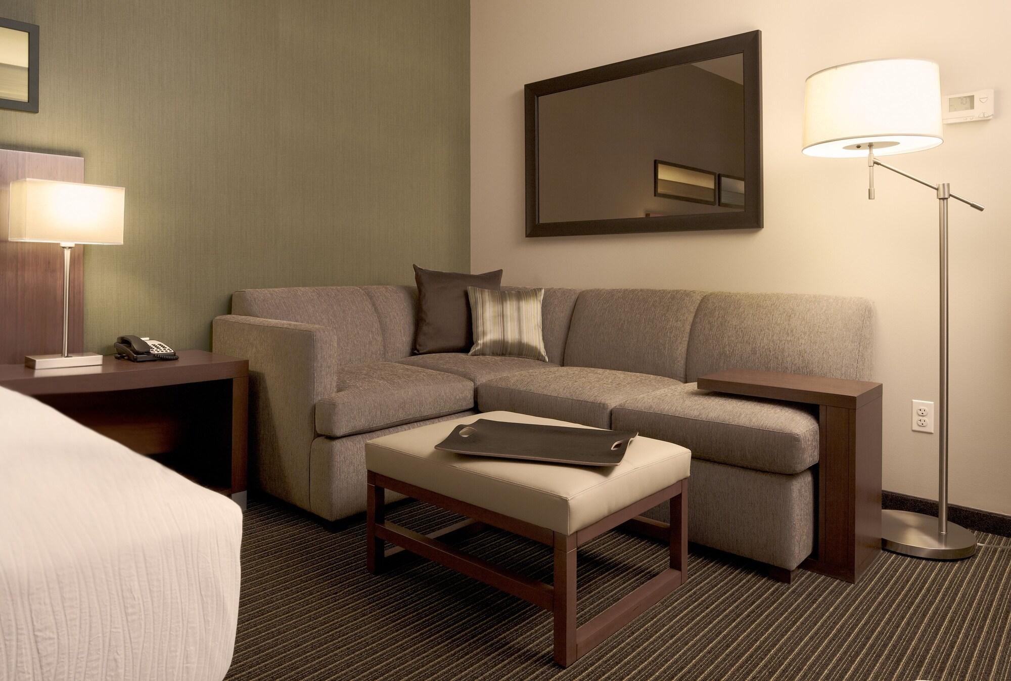 حياة بلايس جورجاون أوديوج فيهار غورغاون المظهر الخارجي الصورة A living room in a typical hotel room